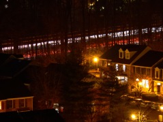 I-270 traffic and townhomes at night