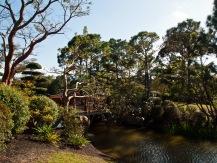 Bridge over lake, Morikami Museum and Japanese Gardens, Delray Beach, FL, USA.